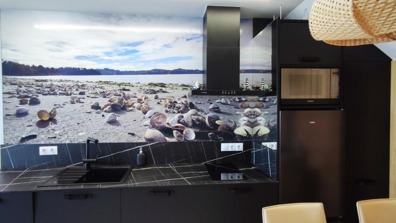 Suite Playa Миньо Экстерьер фото